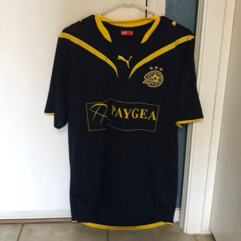 Men’s Puma soccer shirt.